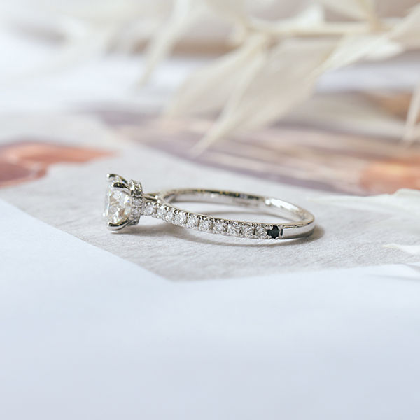 Round Engagement Ring With Hidden Halo Around the Prongs-side