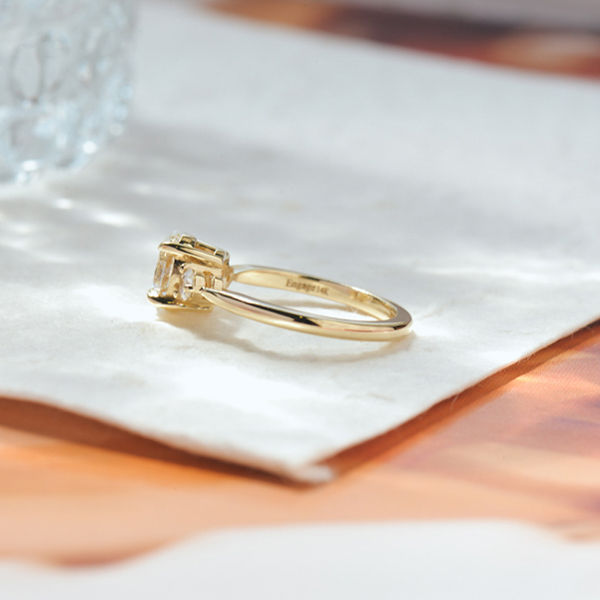 3 Stone Oval And Round Engagement Ring With Tapered Band-side