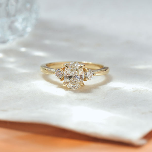 3 Stone Oval And Round Engagement Ring With Tapered Band-top