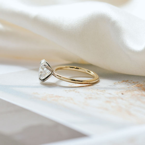 Oval Engagement Ring With Classic Two-Tone Band-side