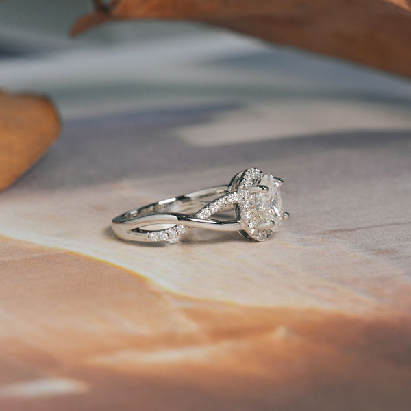 Halo Oval Engagement Ring With Pavé and Split-Shank Band-side