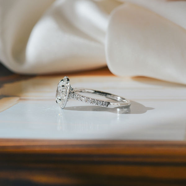 Oval Halo Engagement Ring With Fine Tip Prongs-side