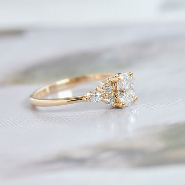 Oval Engagement Ring With Round And Marquise Side Stones-side