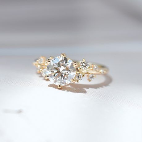 Round Engagement Ring With Clustered Stones -top