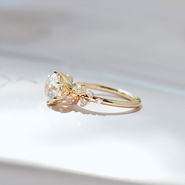 Round Engagement Ring With Clustered Stones -side