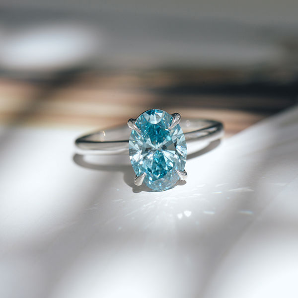 Blue Diamond Oval Solitaire Engagement Ring-top