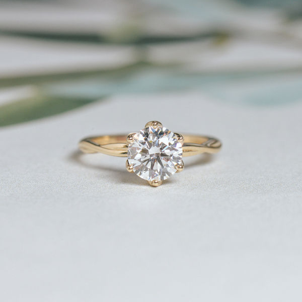 Subtle Twist Band Flower Petal Prong Round Engagement Ring-top