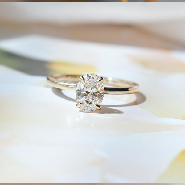 Oval Solitaire Engagement Ring With Sunflower Petal Prongs-top