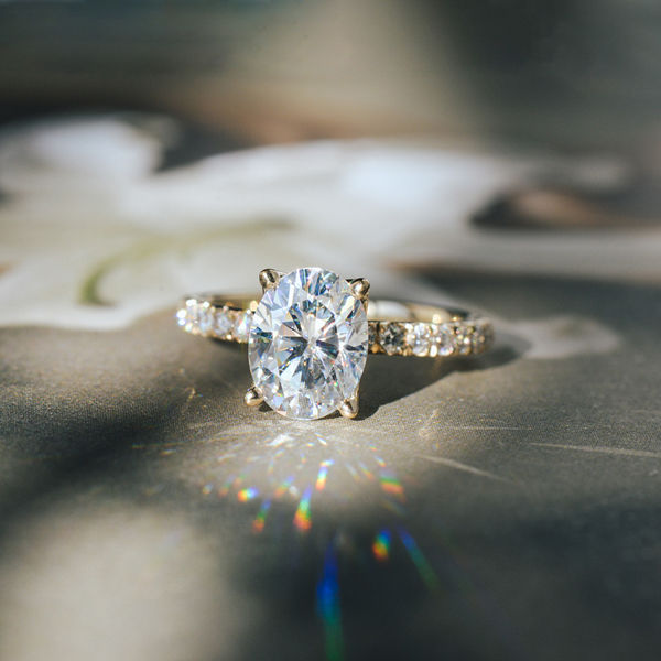 Oval Engagement Ring With Pavé Band and Petal Prong Setting-top