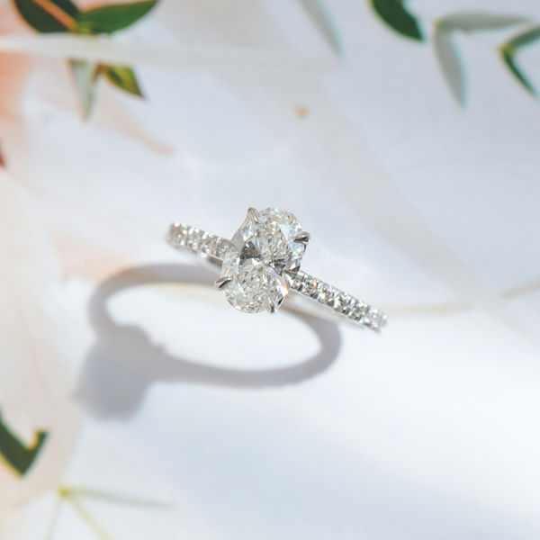 Oval Pavé Solitaire Engagement Ring With Cathedral And Whale Tail-top