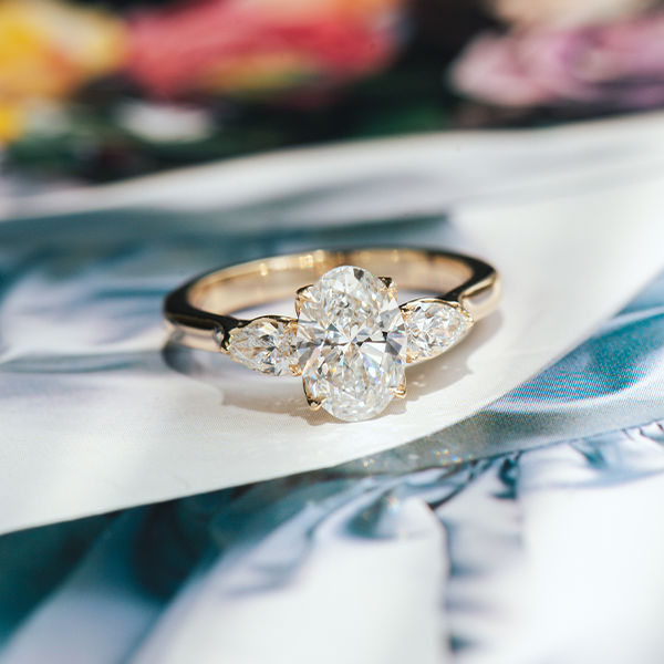 Oval 3 Stone Engagement Ring With Pear-top