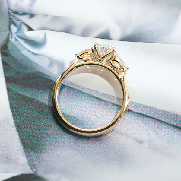 Oval 3 Stone Engagement Ring With Pear-profile