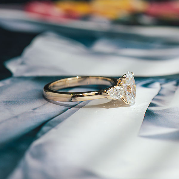 Oval 3 Stone Engagement Ring With Pear-side