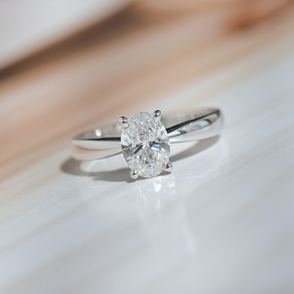 Oval Solitaire Engagement Ring With Tapered Band-top