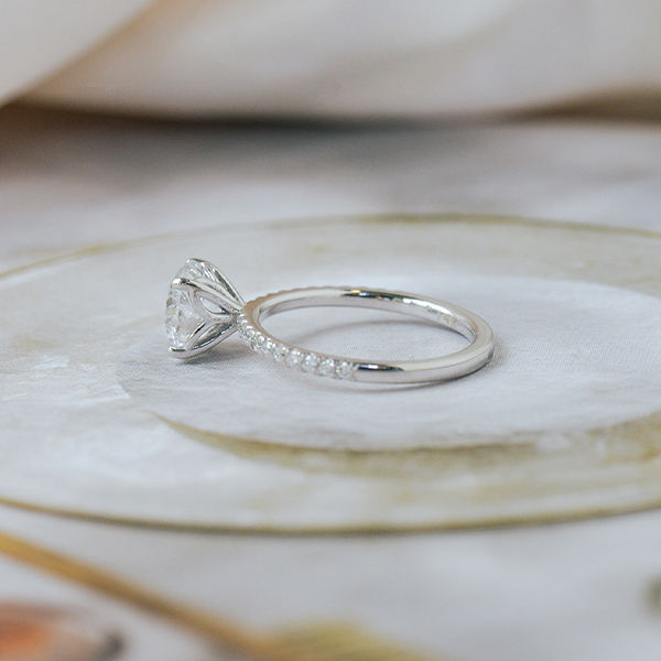 Round Pavé Engagement Ring With Whale Tail -side