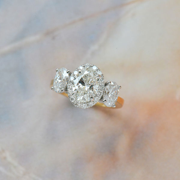 Two-Tone 3-Stone Oval Halo Engagement Ring-top