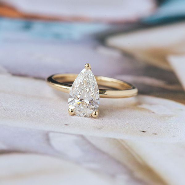 Pear Solitaire Engagement Ring With Hidden Halo-top
