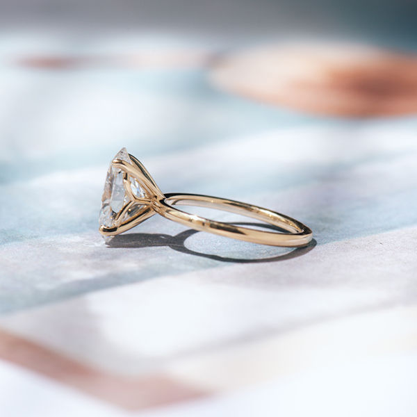 Oval Solitaire Engagement Ring With 1.5mm Band-side