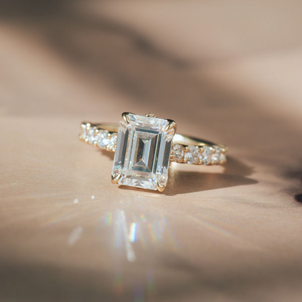 Emerald Moissanite Engagement Ring With Petal Prongs And Pavé-top