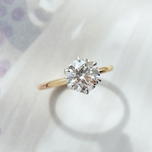 Round Two-Tone Engagement Ring With Petal Prongs-top
