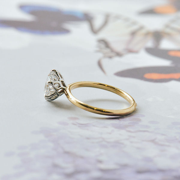 Round Two-Tone Engagement Ring With Petal Prongs-side