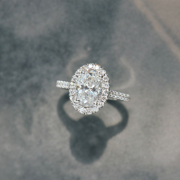 Oval Engagement Ring With Pavé Halo and Cathedral -top