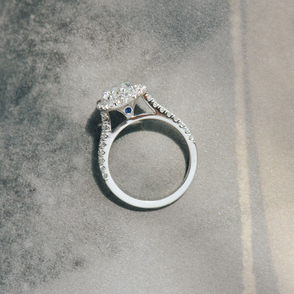 Oval Engagement Ring With Pavé Halo and Cathedral -profile