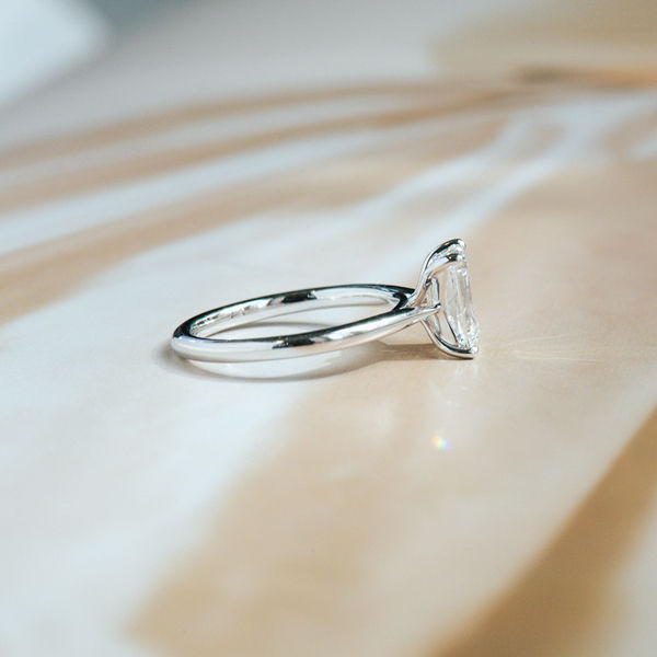 Emerald Solitaire Engagement Ring-side