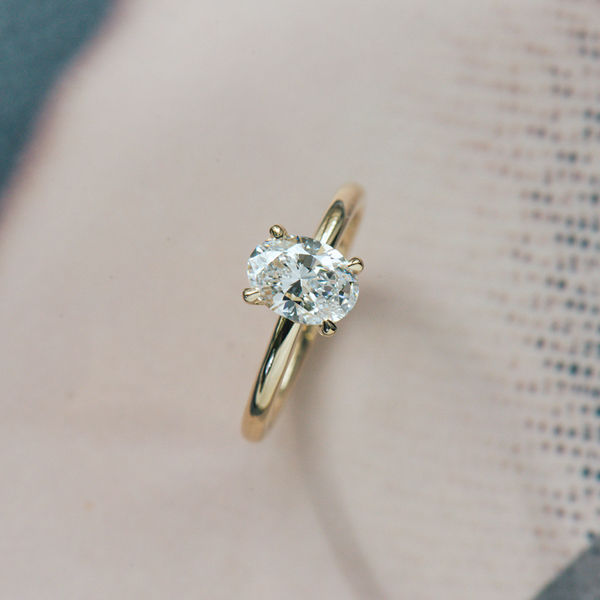 Oval Solitaire Engagement Ring With Hidden Halo And Petite Prongs-top