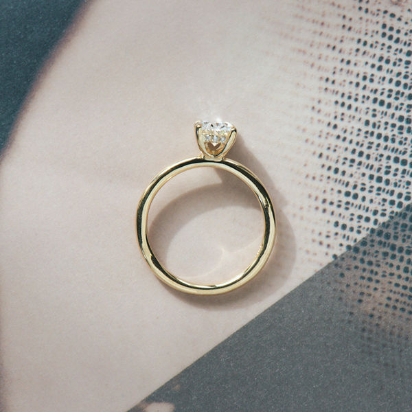 Oval Solitaire Engagement Ring With Hidden Halo And Petite Prongs-profile