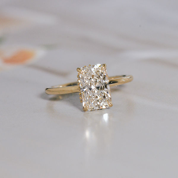 Radiant Engagement Ring With Different Size Stones Hidden Halo -top