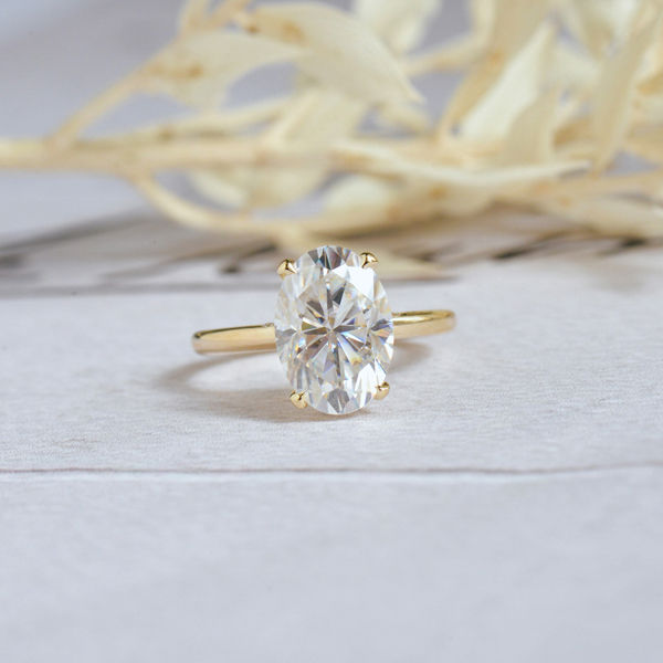 Oval Moissanite Solitaire Engagement Ring With Pavé Bridge-top