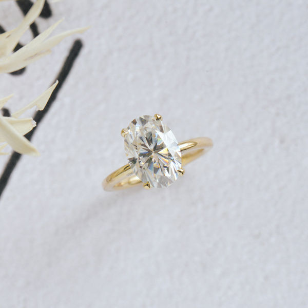 Oval Moissanite Solitaire Engagement Ring With Pavé Bridge-side