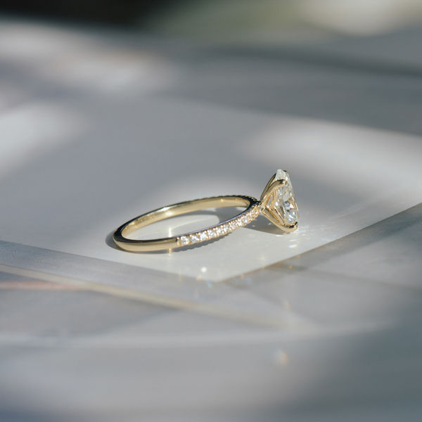 Oval Solitaire Engagement Ring With Pavé-side