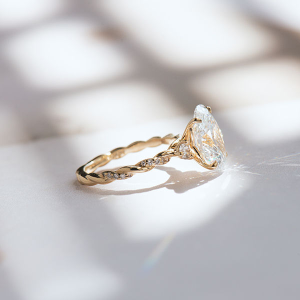 Oval 3-Stone Engagement Ring With Pavé Twist Band-side