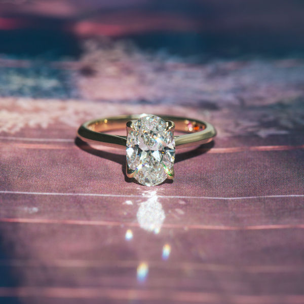 4-Prong Oval Engagement Ring With Petal Prong - Top