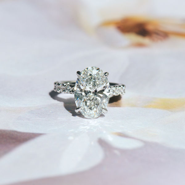 French Pavé Oval Engagement With Hidden Halo Between Claws - Top