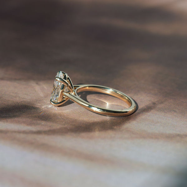 Oval Solitaire Engagement Ring With Cathedral - Side