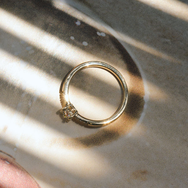 Solitaire Round Engagement Ring With Tapered Band - Side