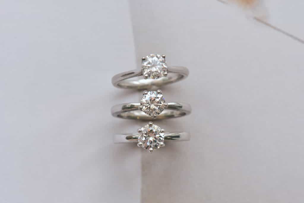 round solitaire engagement rings different prongs comparison