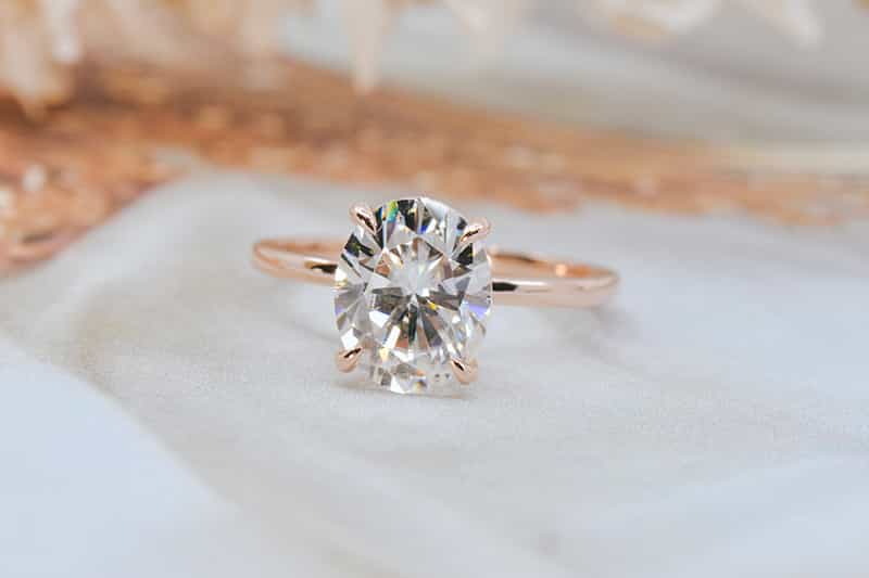 oval rose gold moissanite ring