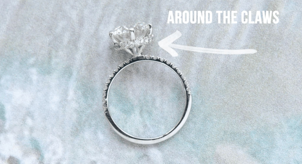 hidden halo engagement ring with hidden halo around the claws