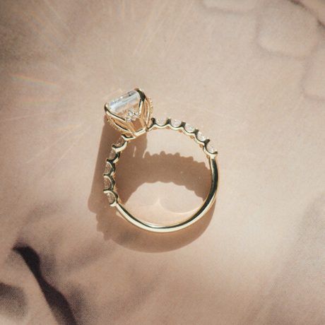 Emerald Moissanite Engagement Ring With Petal Prongs And Pavé-profile