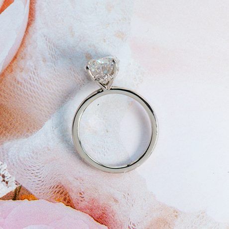 Oval Solitaire With Staggered Hidden Halo Engagement Ring-profile