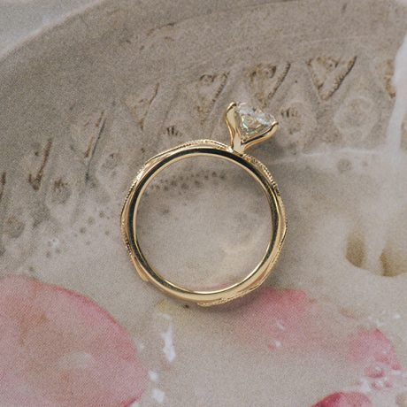 Oval Engagement Ring With Round Stones in Marquise-Shaped Cutout-profile