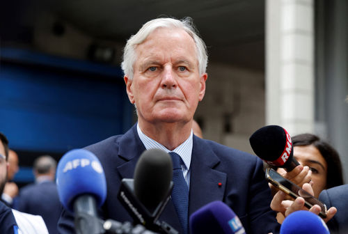 France's newly appointed Prime Minister, Michel Barnier speaks to the press as he visits the SAMU de Paris headquarters at the Necker hospital in Paris, for his first official visit since taking office, on September 7, 2024. (Photo by Ludovic MARIN / AFP)