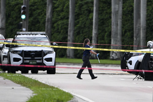 Members of FBI are seen at the crime scene outside the Trump International Golf Club in West Palm Beach, Florida, on September 15, 2024 following a shooting incident at former US president Donald Trump's golf course.