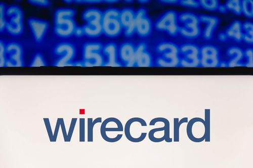  In dieser Foto-Illustration ist das Logo der Wirecard AG auf einem Smartphone zu sehen, mit den Börseninformationen im Hintergrund.