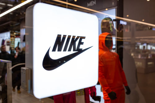 Nike - Logo in front of a Nike store