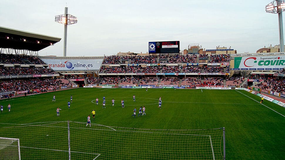 Nuevo Estadio de Los CármenesBlue background